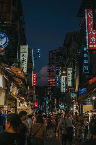human people walking along alley road person