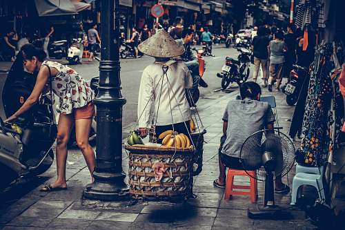 person person carrying fruit baskets human