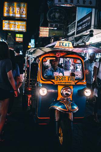 human person riding on Taxi cub thailand