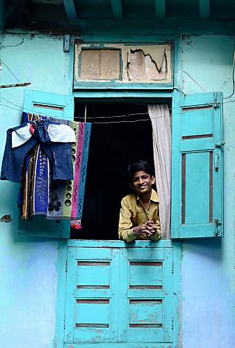 human person smiling in window person