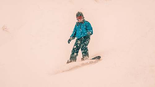 human person using snowboard person