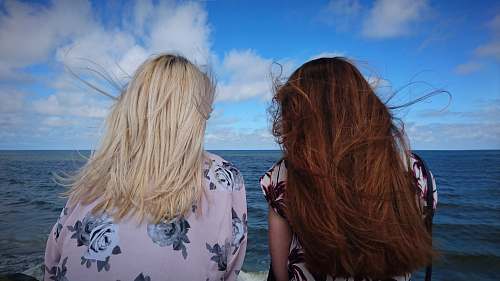 woman photography of two women seeing horizon during daytime blonde