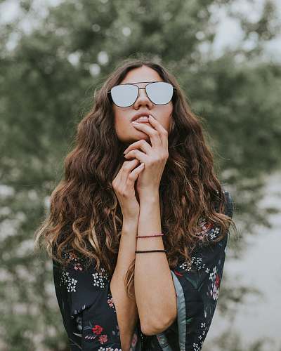 human portrait photo of woman wearing sunglasses person