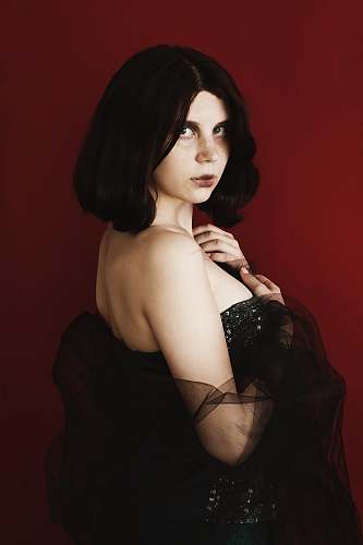 human portrait photography of woman in black dress person