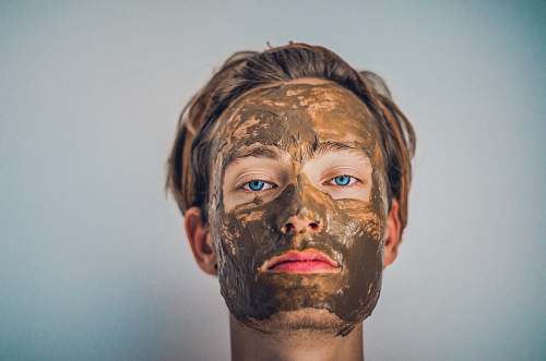 person shallow focus photography of men's muddy face face