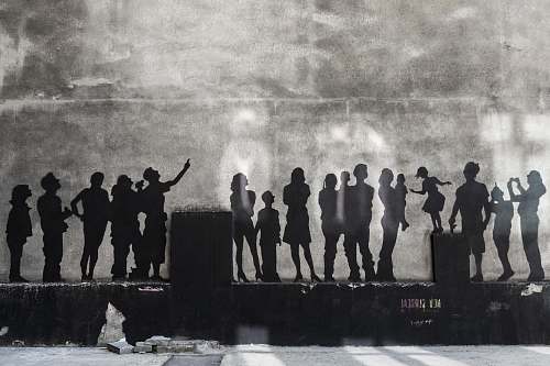 human silhouette of people wall art photo person