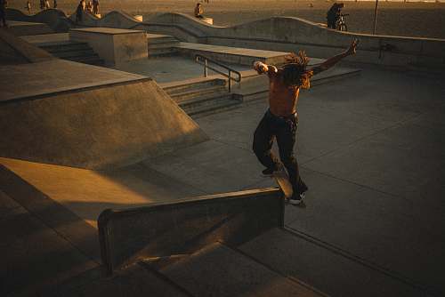 person topless man doing skateboard tricks human