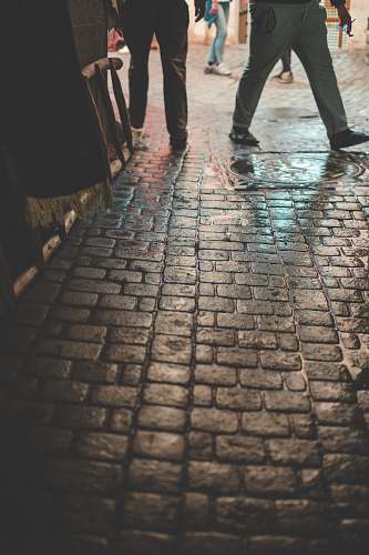 person two person standing on gray floor human