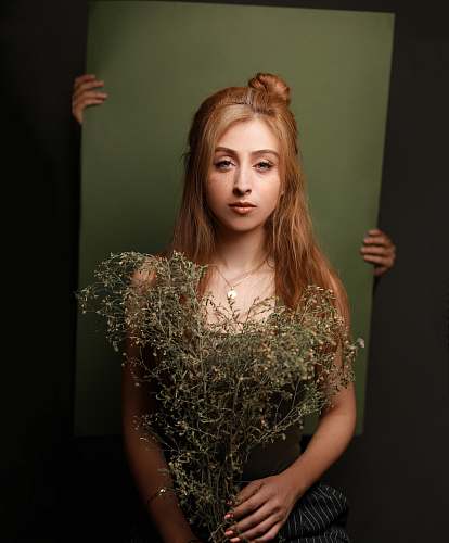 person woman holding withered plants plant