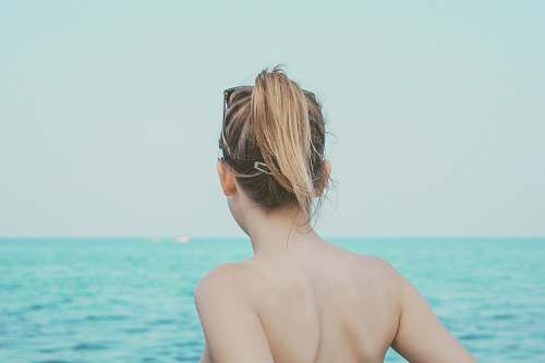 person woman looking at sea at daytime human