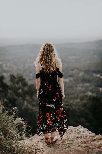 human woman standing near the cliff person