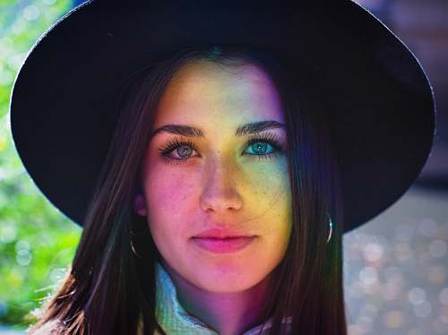 human woman wearing black hat person