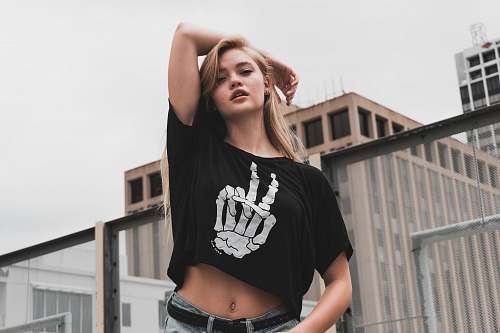human women's black crop-top person