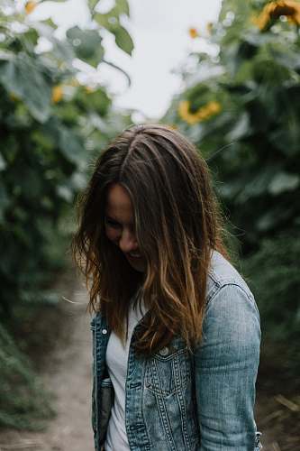 human women's gray denim button-up jacket person