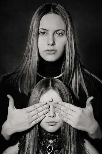 people grayscale photo of woman and girl black-and-white
