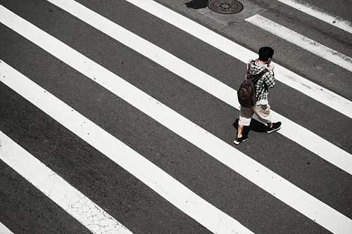 people man crossing at pedestrian lane zebra crossing
