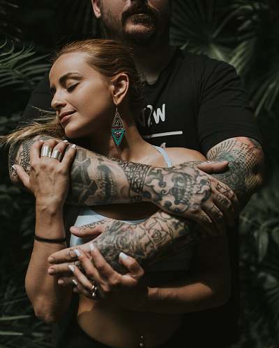 people man hugging a woman human