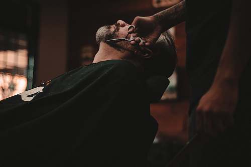 people man sitting on barber's chair human