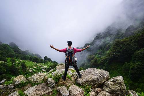 people man standing on mountain human
