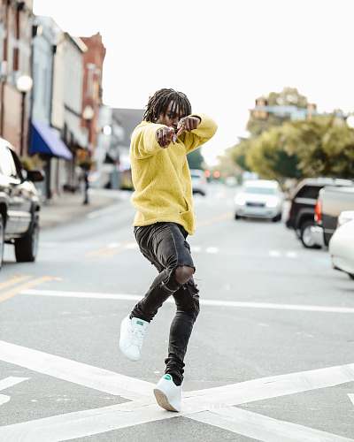 people man standing on street at daytime human