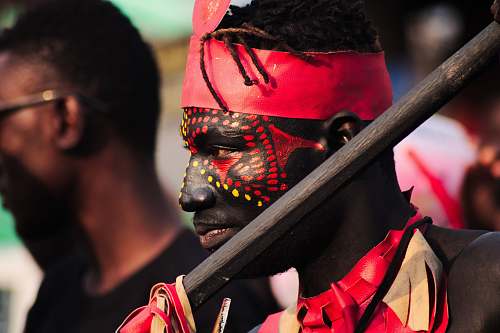 people man with red and yellow face paint human