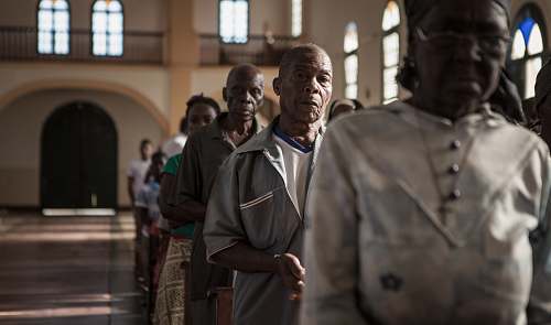 people people attending mass in church building