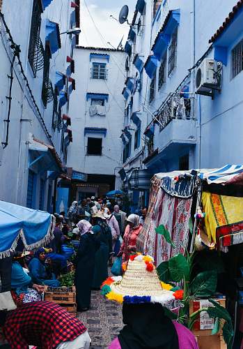 people person buying good on street market