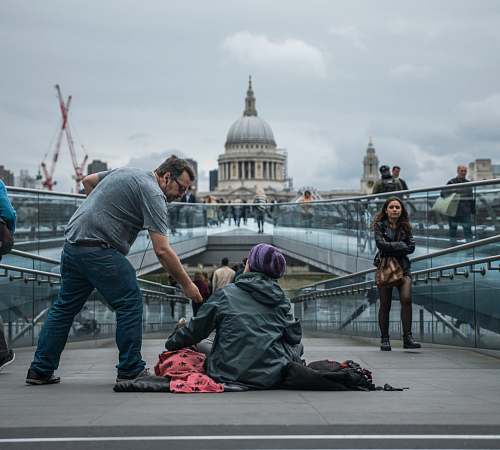 people person sitting on floor near people london