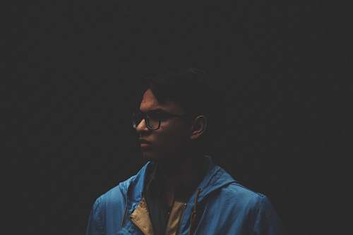 people selective focus photo of man with dark background human