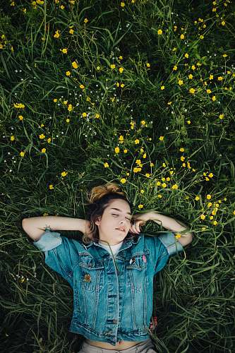 people woman lying on grassland human