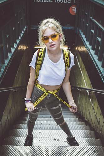 people woman on gray staircase human