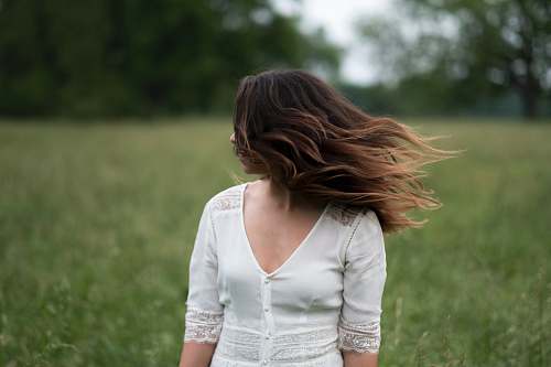 human woman standing in grass field people