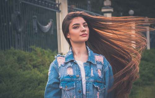 people woman waving her long brown hair human