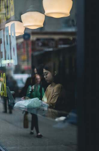 people woman wearing brown crew-neck shirt human
