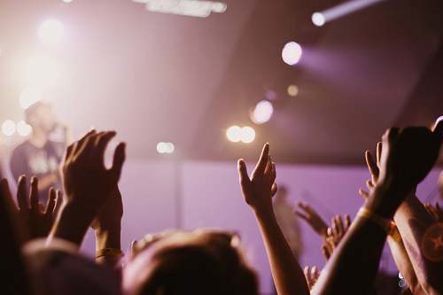 worship group of people listening to concert hands