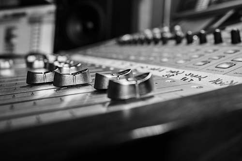 grey grayscale photo of audio mixer studio