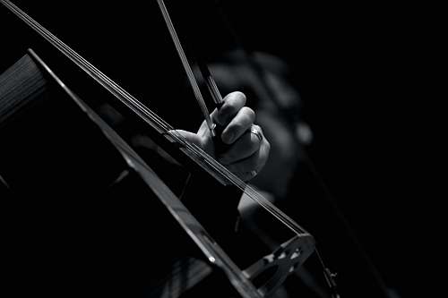 voghera grayscale photo of persons playing violin italy