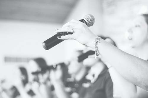 music person holding microphone rockford