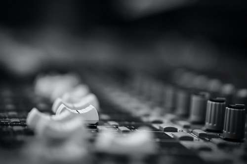 grey selective grayscale photography of mixing console recording table