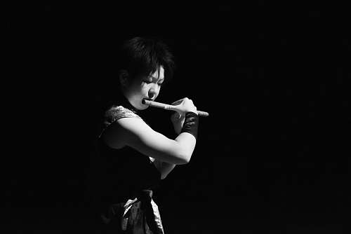 human woman playing flute person