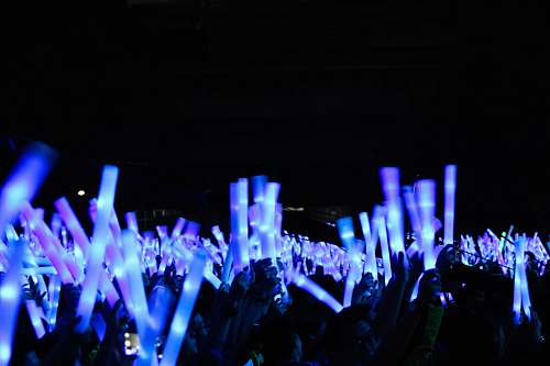 lights people holding light bars illuminated
