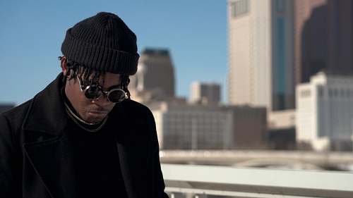 apparel man wearing black coat human