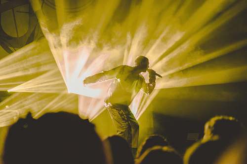 norway man standing while performing band in front of crowded people man