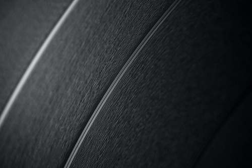 black-and-white grayscale photo of a textile audio speaker