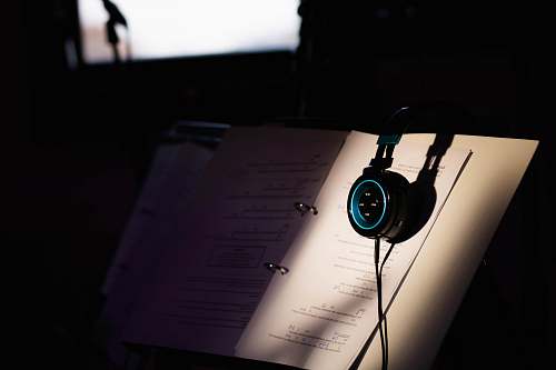 headphones headphones on music book headset