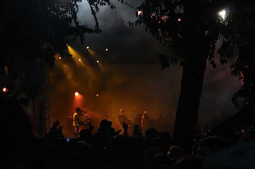 light stage with band performing crowd