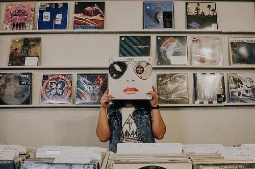 jar person covering face with vinyl sleeve plant