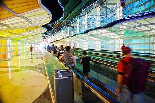 chair people on walkalator o'hare international airport