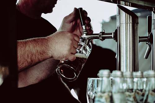 beer person holding beer mug drink