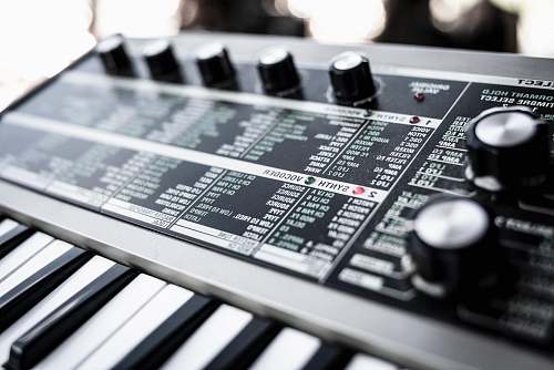 mixer shallow focus photo of electronic keyboard keyboard